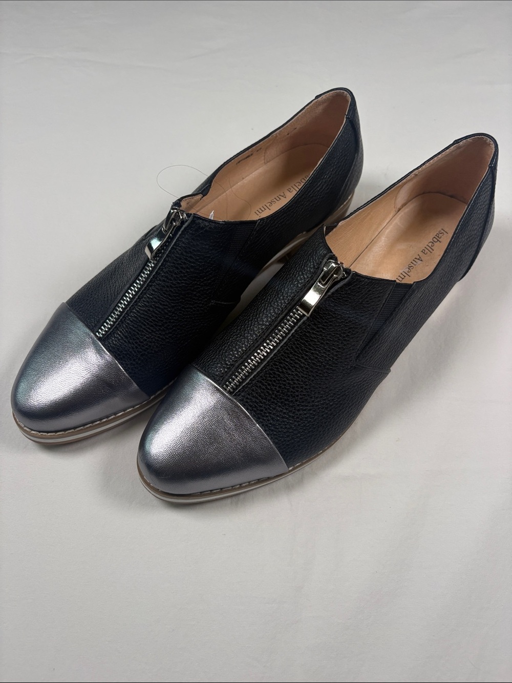 Isabella Anselmi Black Leather Flats with Silver Cap Toe and Center Zipper